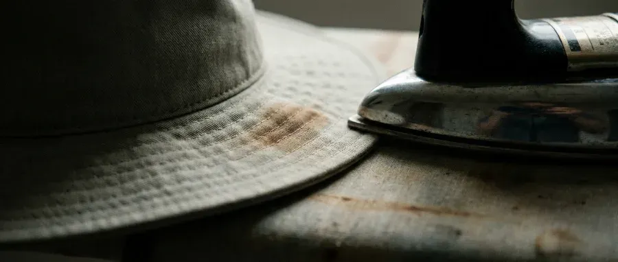 Scorched hat brim from patch removal mistake