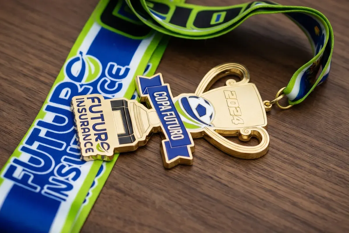 Die cast custom medal with dimensional 3D relief and custom shape for sports awards