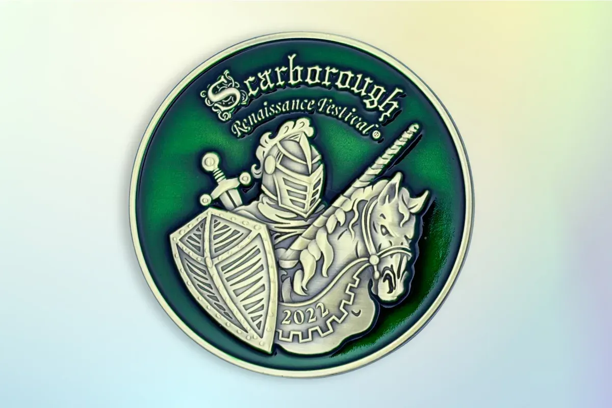 Custom 3D sculpted cast lapel pin with raised dimensional detail and antique bronze finish