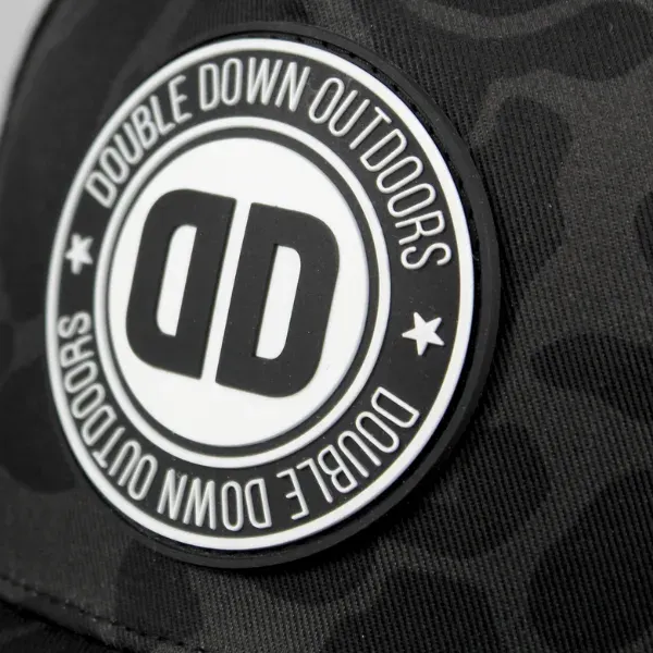 black and white PVC patch ironed on New Era hat