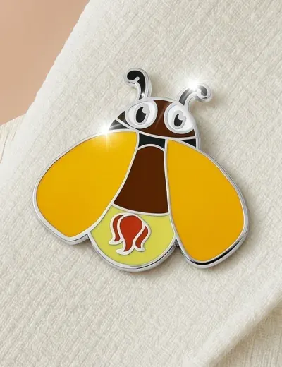 Custom hard enamel lapel pin with detailed insect design
