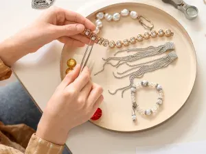 cleaning brass jewelry over head view