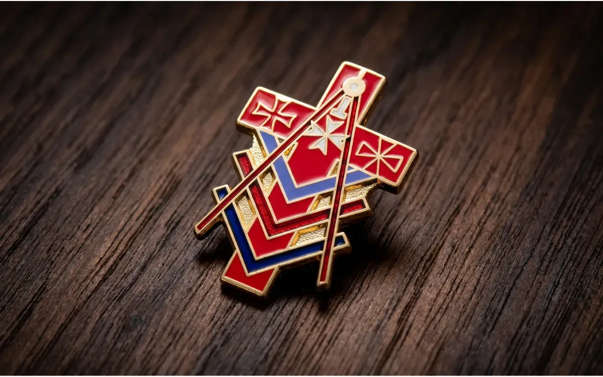 Custom cloisonné lapel pin with hard-fired red, white, and blue enamel in cross design