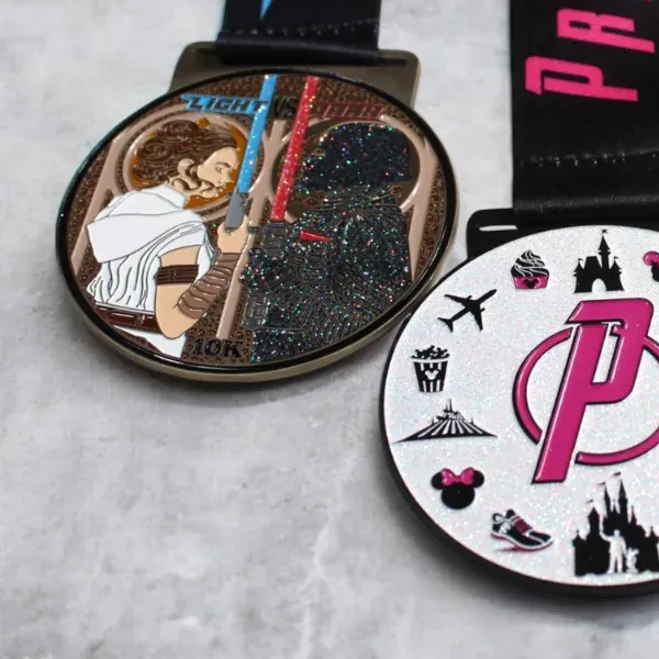 three metal race medals with glitter enamel