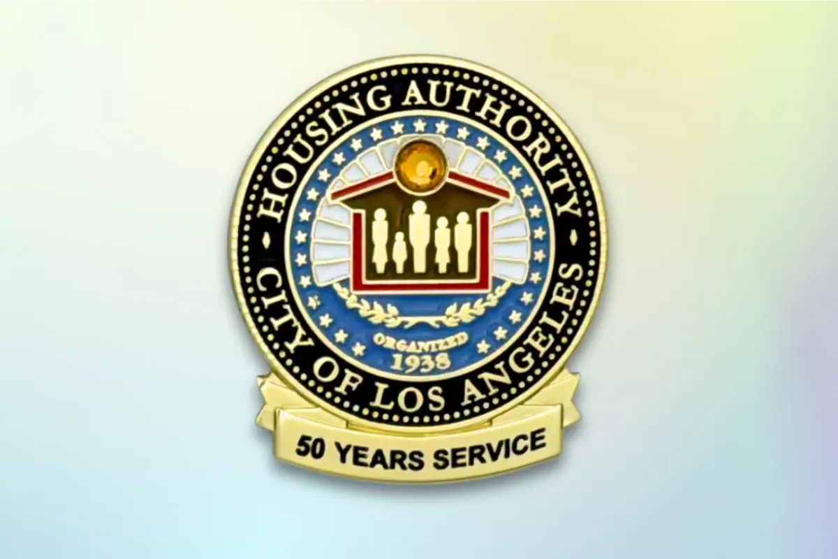 Custom soft enamel service award lapel pin with 50-year tenure recognition and municipal seal design