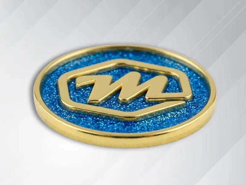 Custom lapel pin shown with soft enamel color fill and raised metal lines