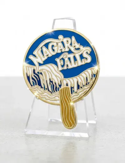 Custom Niagara Falls hard enamel souvenir lapel pin displayed on stand