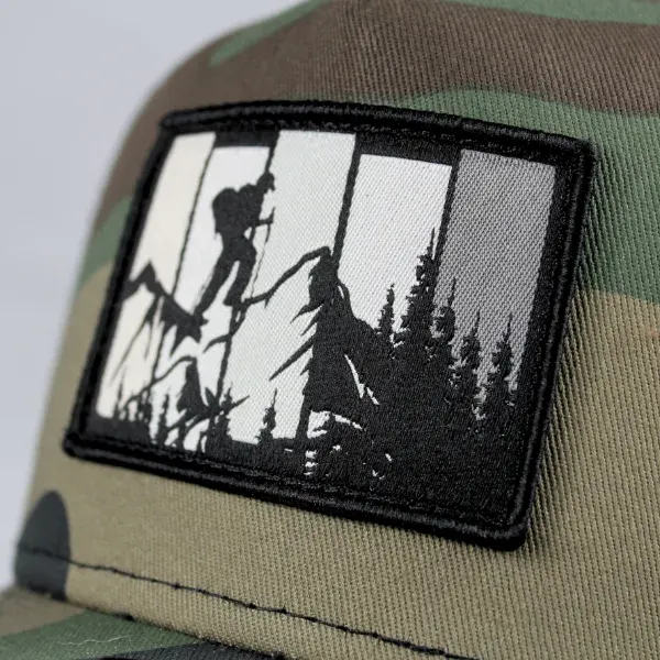Custom iron-on woven patch with mountain climber silhouette design