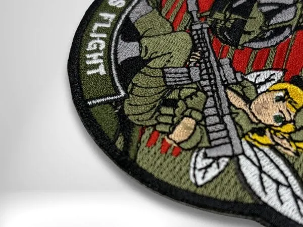 Embroidered military flight patch with a heat-cut sealed border