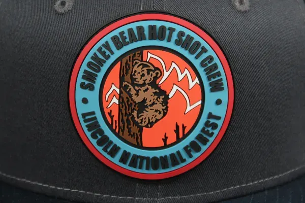 Custom PVC Smokey Bear national forest patch on a black hat