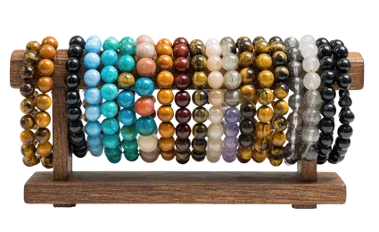 standing wood display with charm bead bracelets