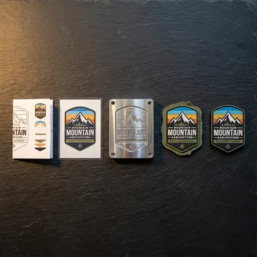 Five stages of custom PVC patch production laid out in sequence from artwork to finished rubber patch