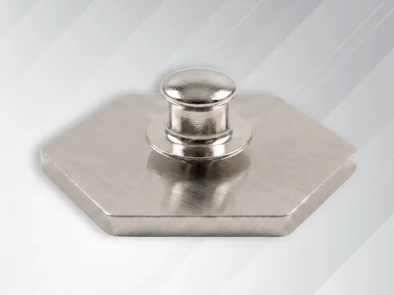 Reverse side of custom enamel pin showing locking pin back attachment