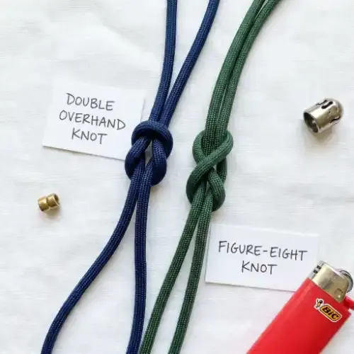 Double overhand knot and figure-eight knot tied in nylon cord for phone charm attachment
