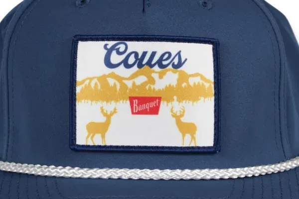 Custom printed Coues patch with deer and mountains on a navy rope hat
