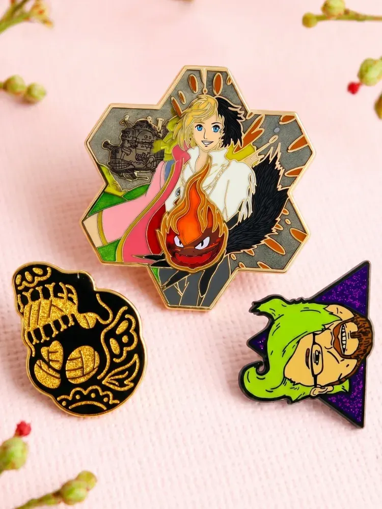 Custom glitter enamel pin close-up showing sparkle detail