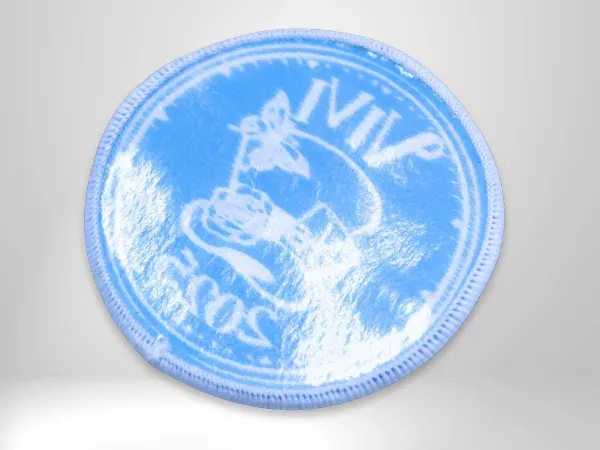 Blue and white embroidered patch with iron-on heat-press backing