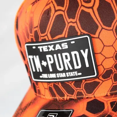 Team Purdy leather patch on camo hat
