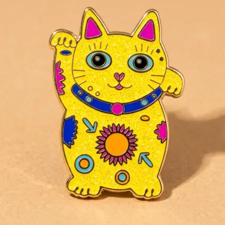 Custom enamel pin with yellow glitter enamel fill