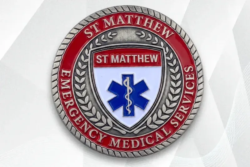 Custom EMS challenge coin with blue Star of Life