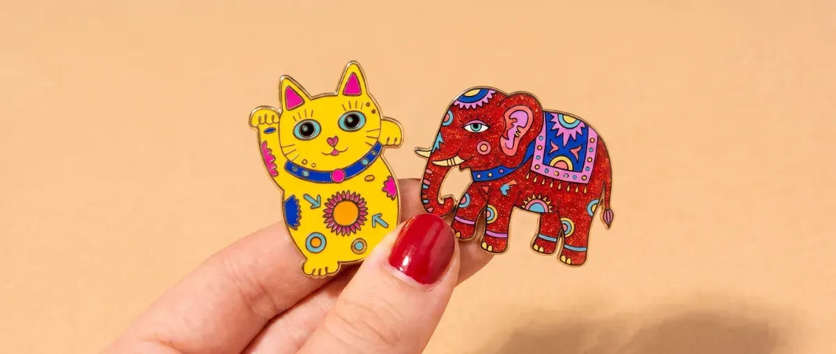 Acrylic Pins vs. Enamel Pins: What to Choose for Your Design