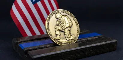 custom coin on wooden stand