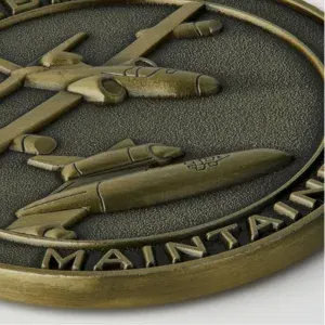 Military tribute challenge coin with kneeling soldier and American flag