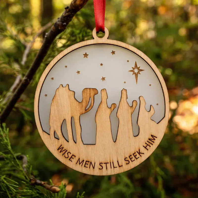 wood ornament with wise men engraved