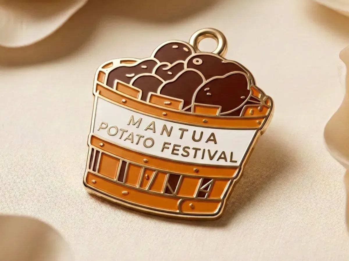 Enamel and cast metal charm with color fill