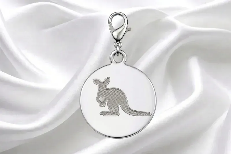 engraved metal charm